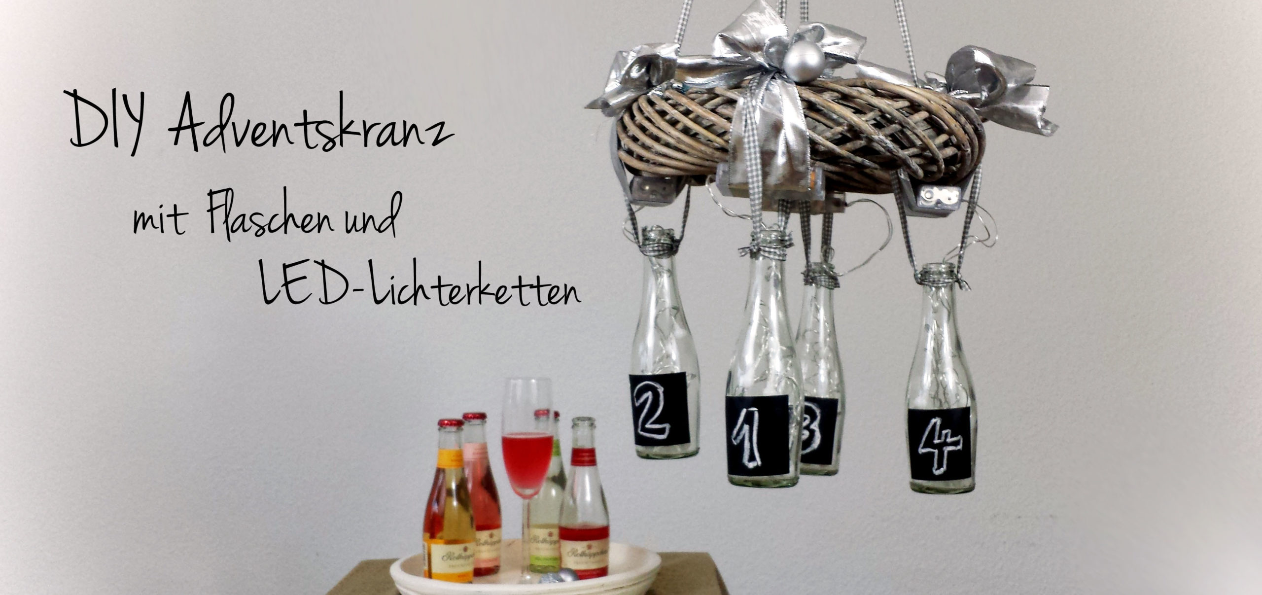 DIY Adventskranz mit Flaschen und LED-Lichterketten